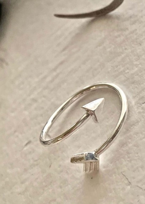 "MISGUIDED" ARROW RING