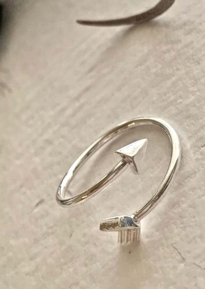 "MISGUIDED" ARROW RING