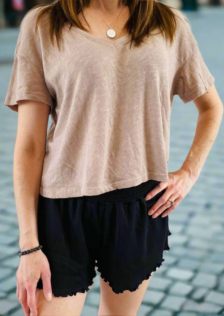 LET IT GLOW V NECK TOP
